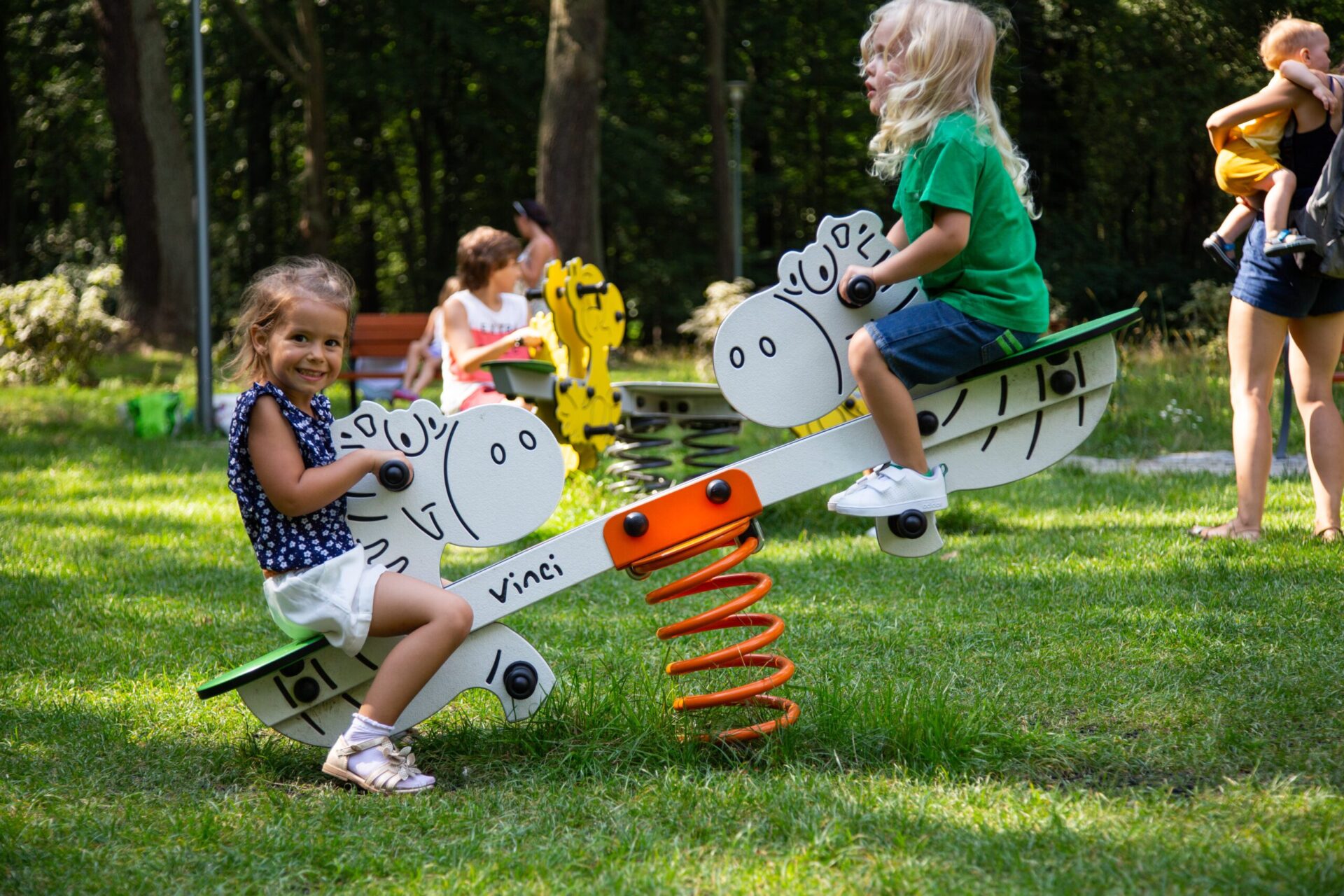 Dubbele veerwip met kinderen