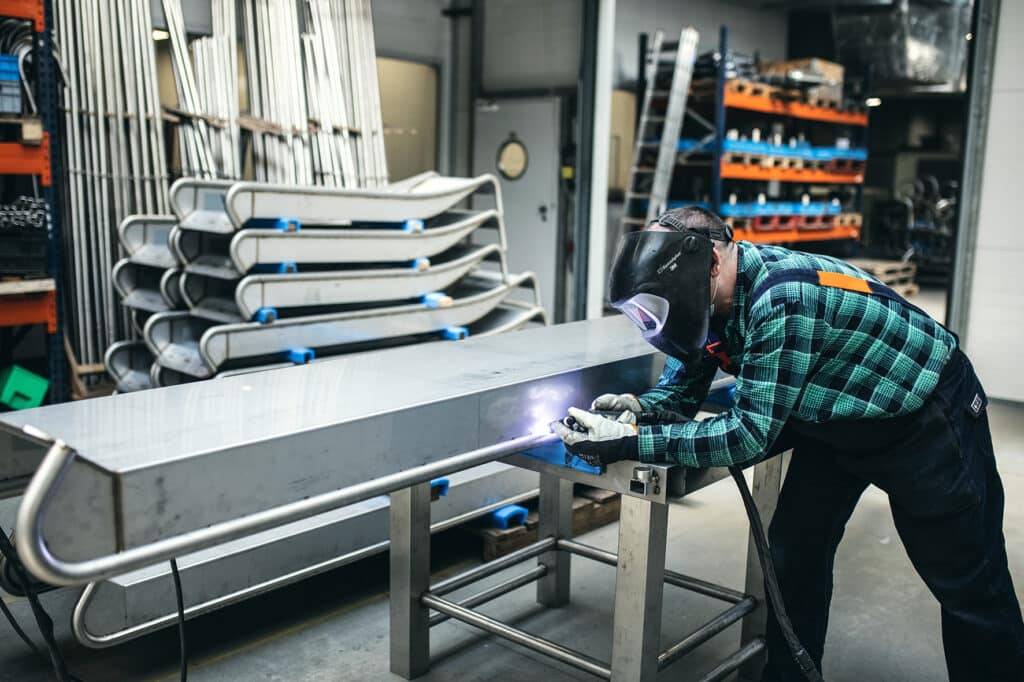 Lassen van inox glijbaan